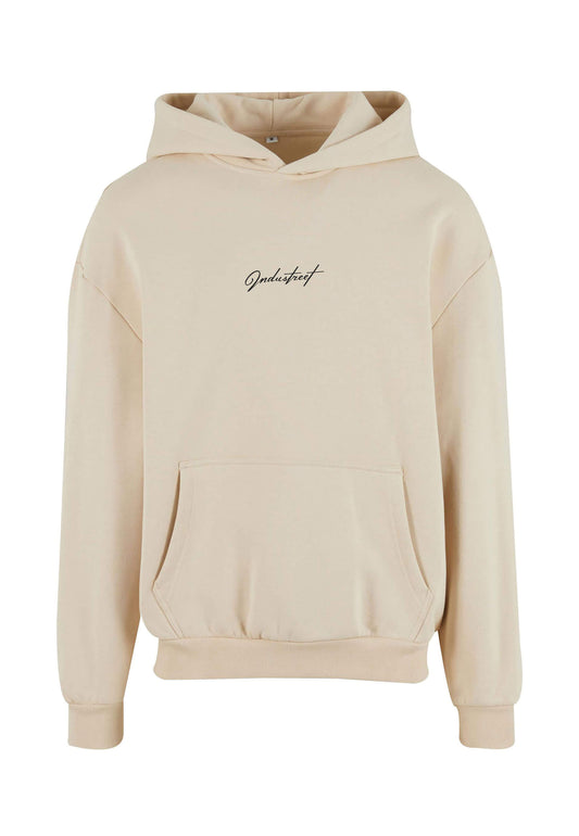 Pull broderie premium beige, coupe ample et confort optimal.
