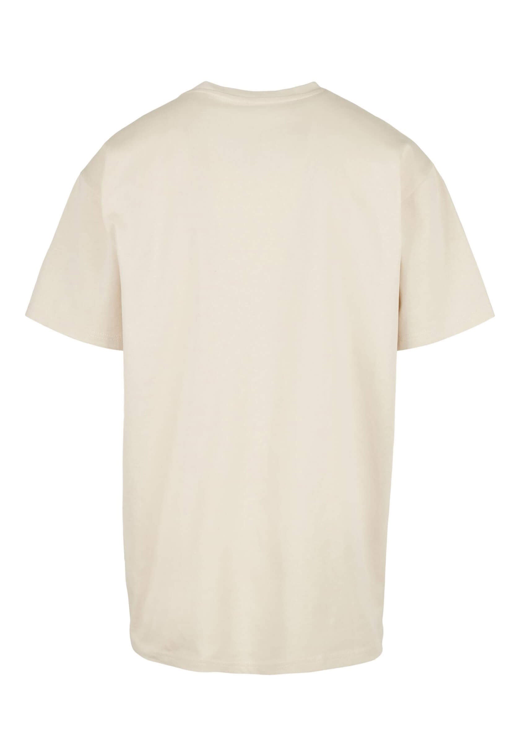 Dos du t-shirt broderie premium beige, finition haut de gamme.